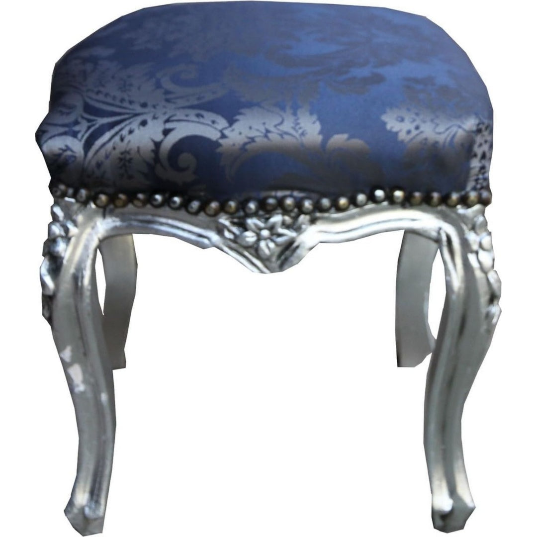Hocker aus Stoff und Massivholz