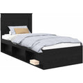 Das Bettgestell misst 75 x 190 cm in Schwarz und Naturbraun